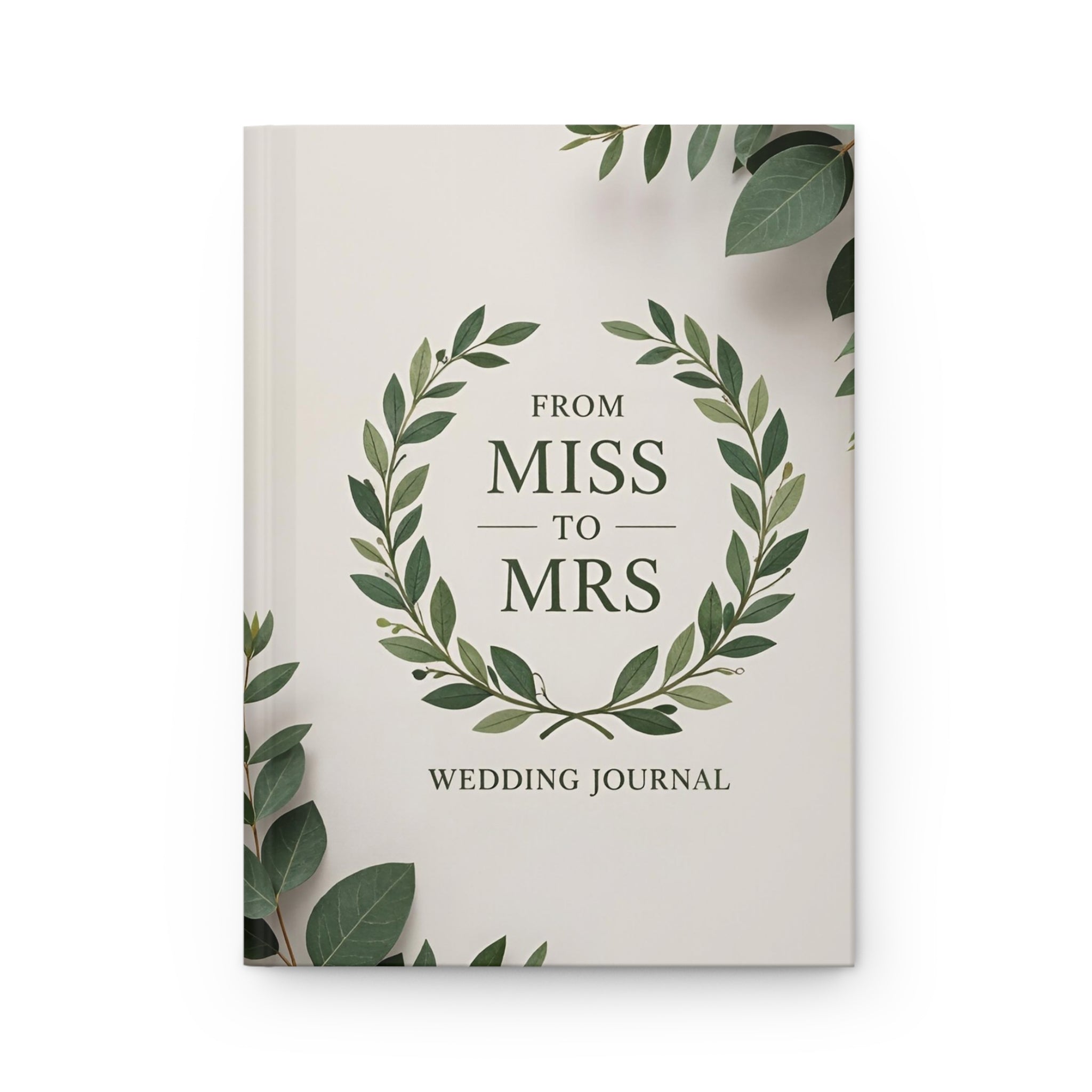 Wedding journal titled 'From Miss to Mrs' with leaf design on a white background