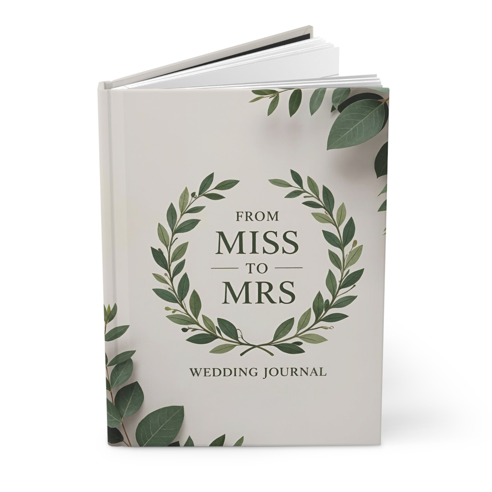 Wedding journal titled 'From Miss to Mrs' with green leaf design on a white background