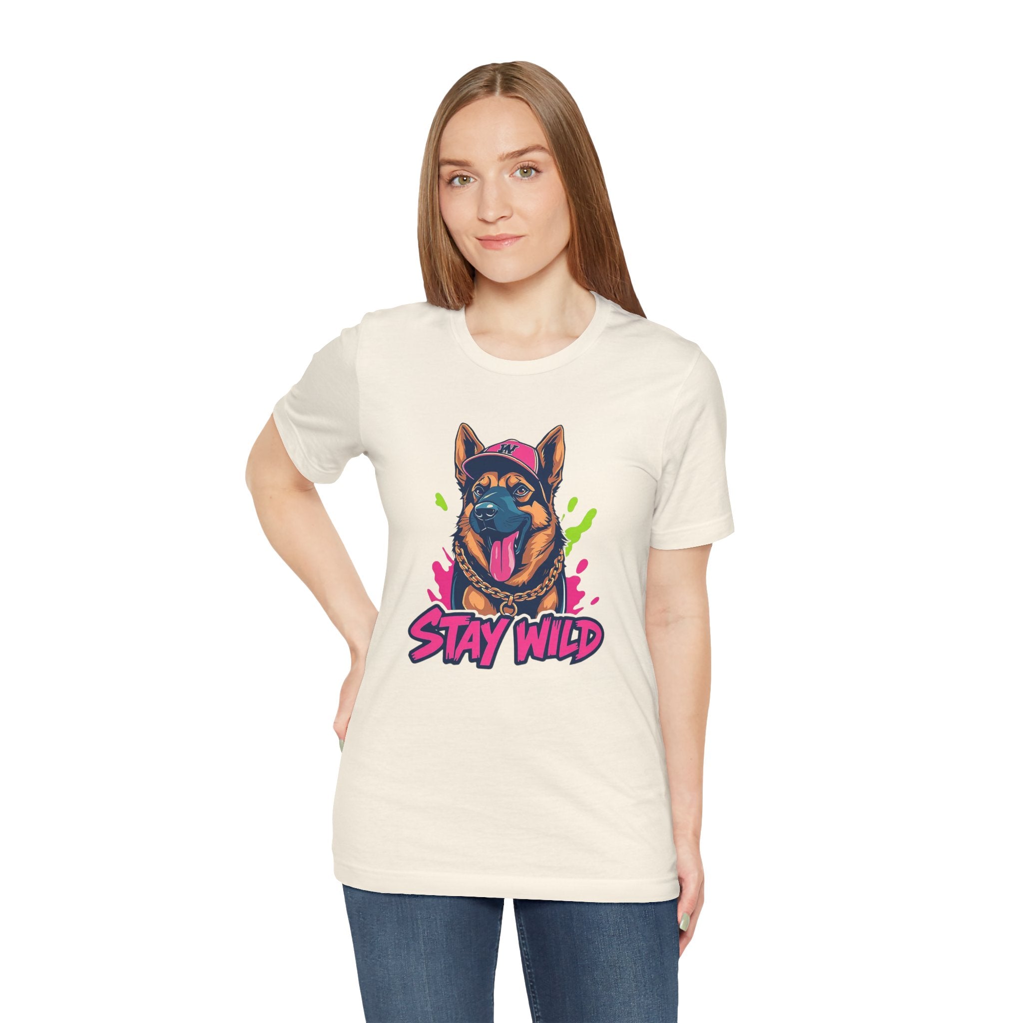 Woman wearing a cream t-shirt with a dog graphic and 'Stay Wild' text on a white background
