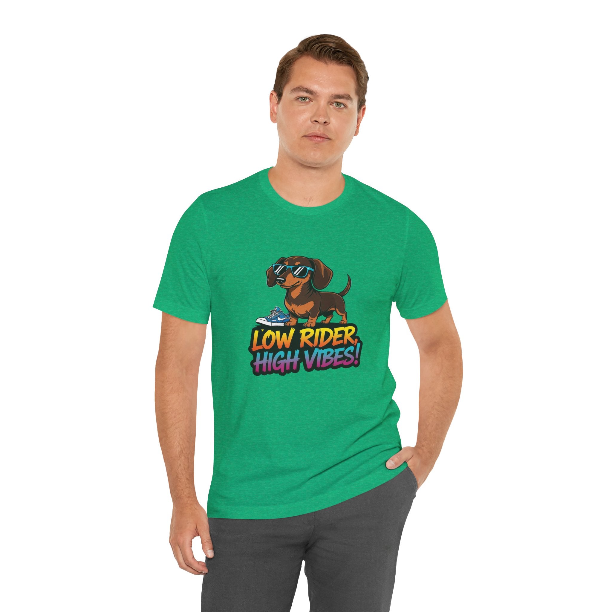 Man wearing a green t-shirt with a dog graphic and text on a white background