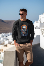 Man wearing a black sweatshirt with a colorful wolf design, standing in a scenic location with white buildings and blue sky.