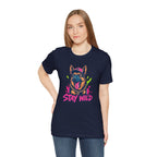 Person wearing a navy blue t-shirt with a dog graphic and 'Stay Wild' text on a white background